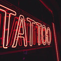 Tattoo and piercing shop Commerce Group